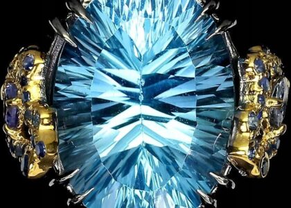 Pierścionek 16.04ct Sky Blue Topaz szafiry r 16.5