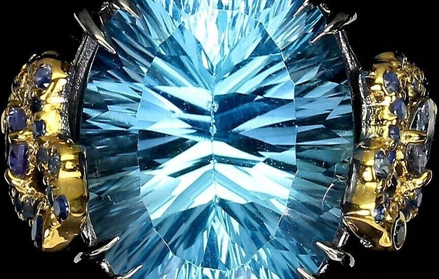 Pierścionek 16.04ct Sky Blue Topaz szafiry r 16.5